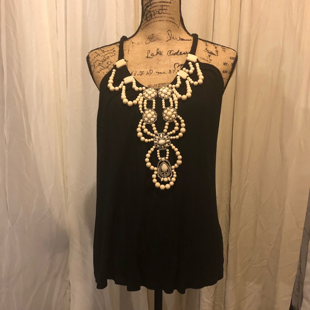 Sleeve top with attached neckline.  Worn twice.